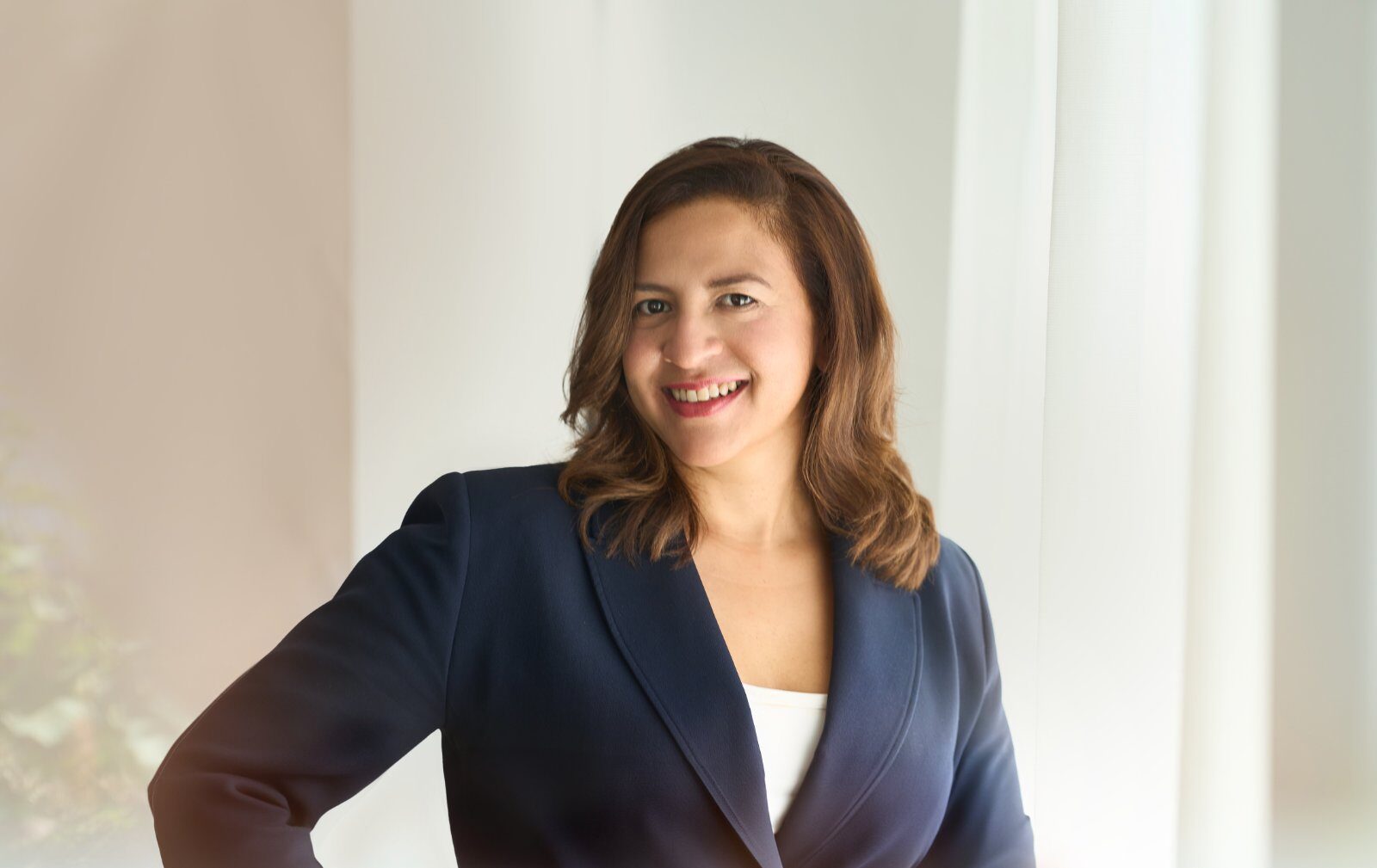 Luisana Milazzo in a navy blazer