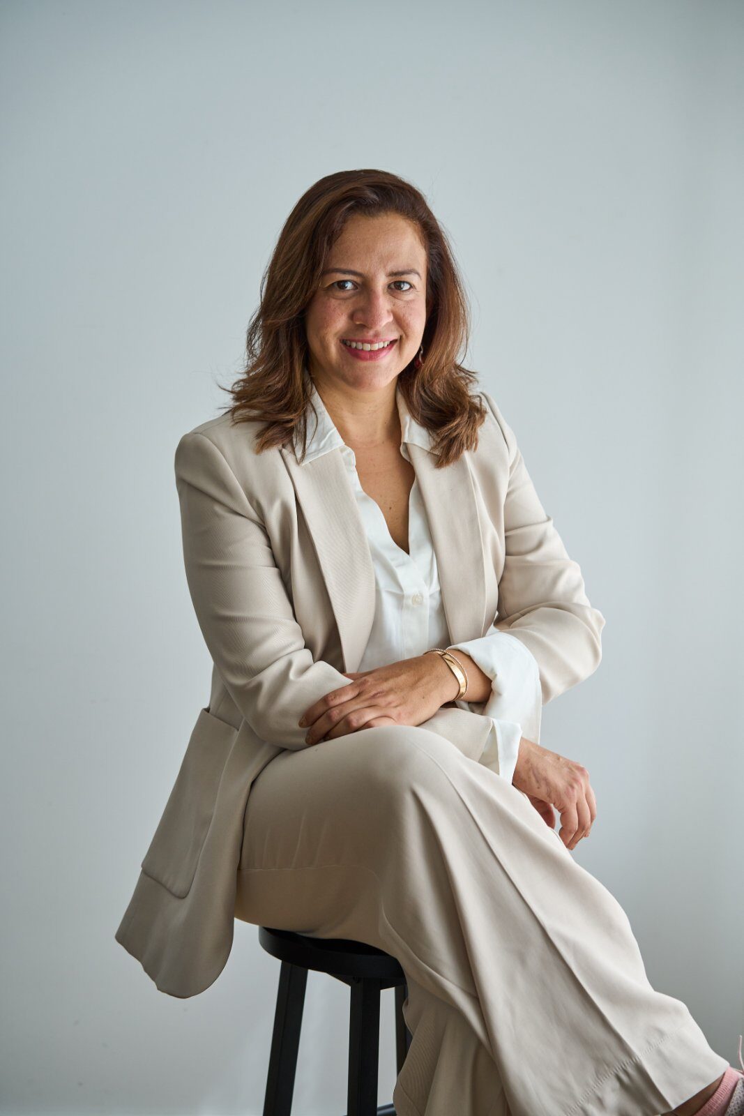 Luisana Milazzo, seated